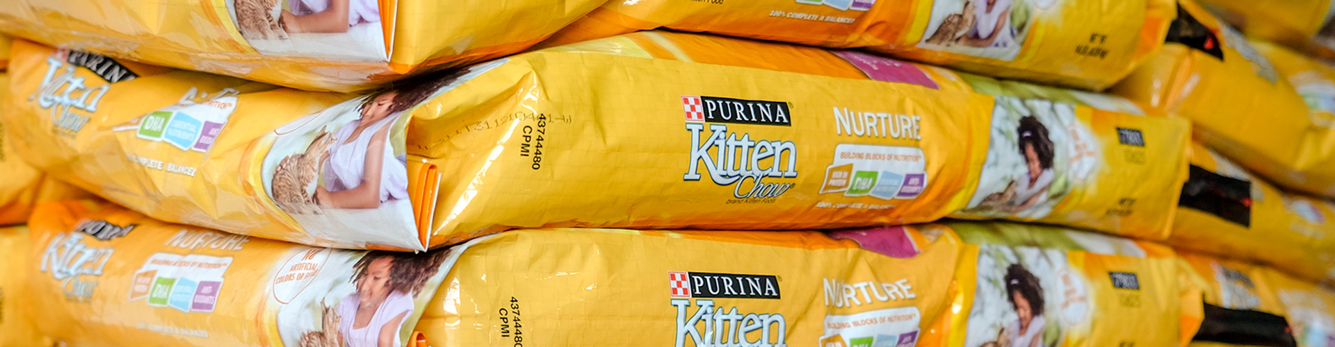 Stacked bags of cat food